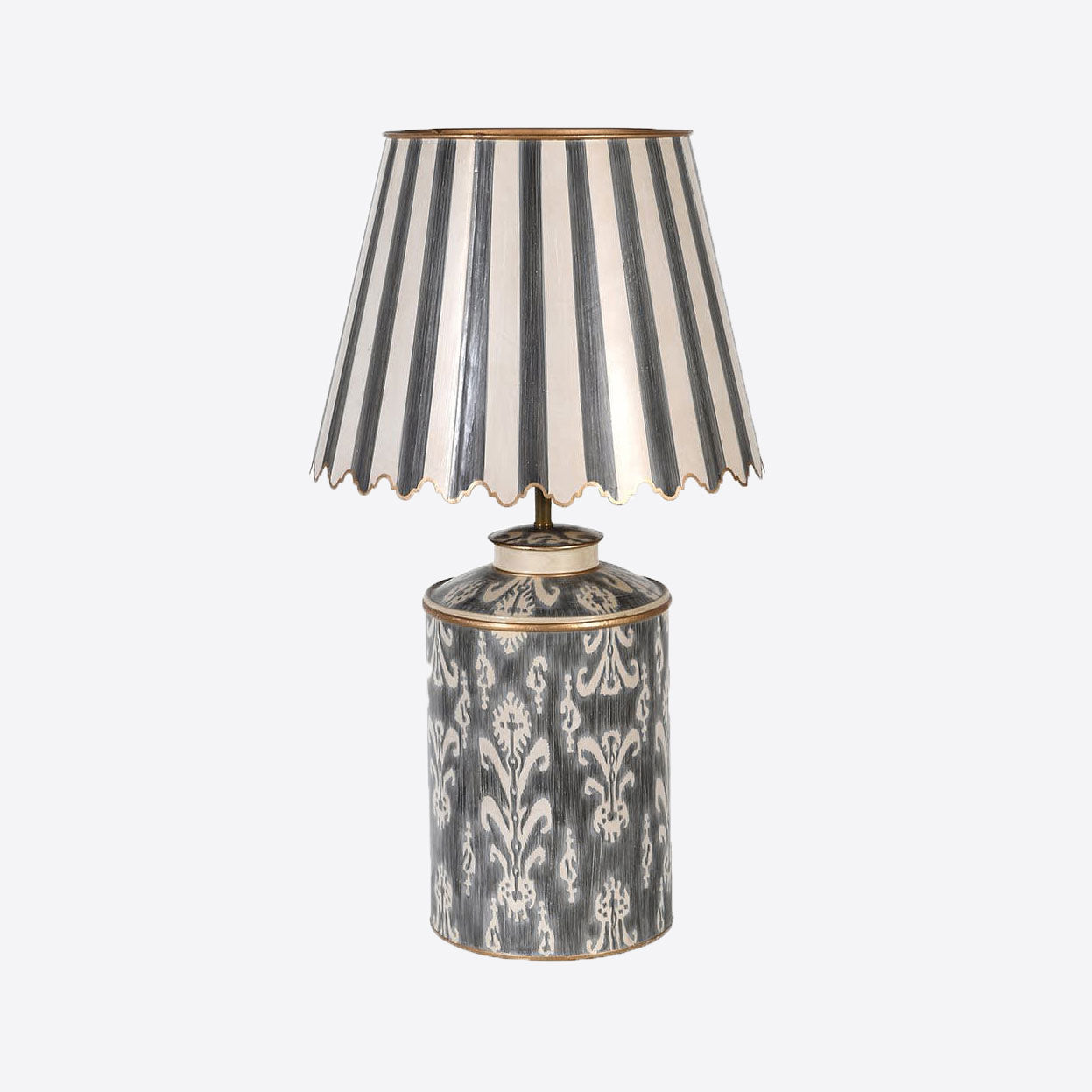 ikat patterned black and white table lamp with black and white striped shade