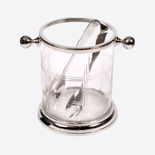 glass ice bucket with silver trim and silver tongues