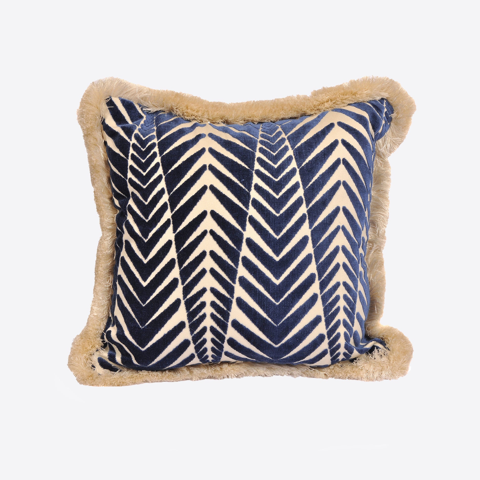 Navy and cream zig zag patterned cushion with tasseled edges