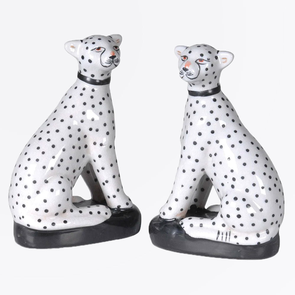pair of black and white spotty ceramic leopard ornaments